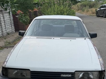 Білий Мазда 626, об'ємом двигуна 2 л та пробігом 300 тис. км за 453 $, фото 1 на Automoto.ua