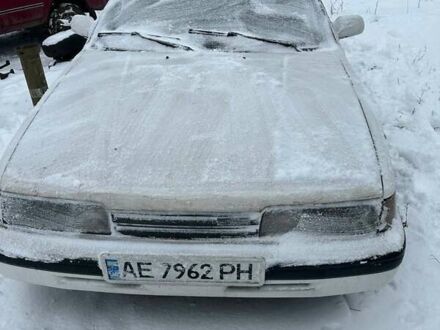 Белый Мазда 626, объемом двигателя 2 л и пробегом 1000 тыс. км за 520 $, фото 1 на Automoto.ua