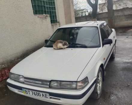 Білий Мазда 626, об'ємом двигуна 2 л та пробігом 200 тис. км за 701 $, фото 1 на Automoto.ua