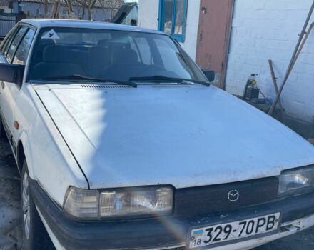 Білий Мазда 626, об'ємом двигуна 2.2 л та пробігом 999 тис. км за 400 $, фото 1 на Automoto.ua