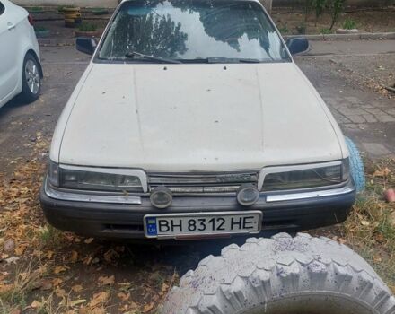 Білий Мазда 626, об'ємом двигуна 1.8 л та пробігом 200 тис. км за 1599 $, фото 1 на Automoto.ua