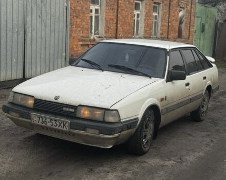 Белый Мазда 626, объемом двигателя 1.6 л и пробегом 380 тыс. км за 1300 $, фото 1 на Automoto.ua