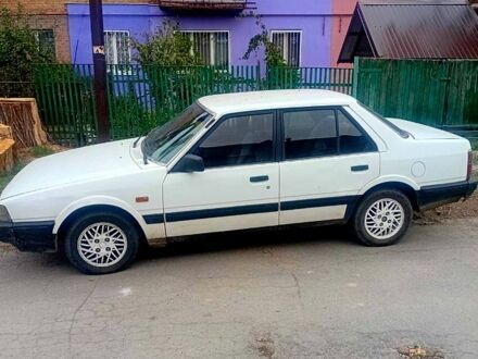 Білий Мазда 626, об'ємом двигуна 2 л та пробігом 300 тис. км за 450 $, фото 1 на Automoto.ua