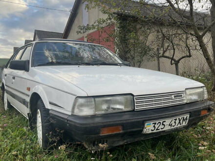 Белый Мазда 626, объемом двигателя 0 л и пробегом 240 тыс. км за 1300 $, фото 1 на Automoto.ua