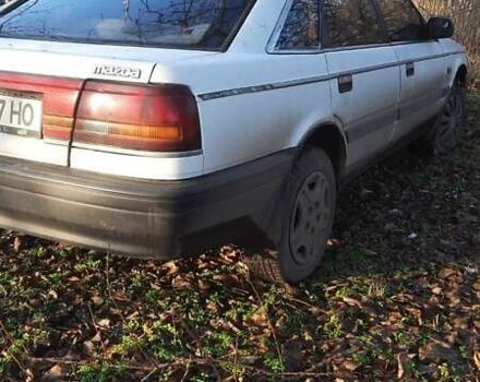 Белый Мазда 626, объемом двигателя 2 л и пробегом 330 тыс. км за 1300 $, фото 1 на Automoto.ua