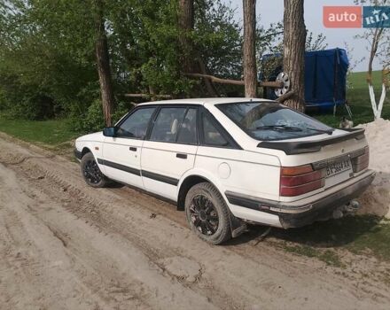 Белый Мазда 626, объемом двигателя 0 л и пробегом 360 тыс. км за 1000 $, фото 1 на Automoto.ua