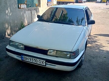 Белый Мазда 626, объемом двигателя 2 л и пробегом 111 тыс. км за 1350 $, фото 1 на Automoto.ua