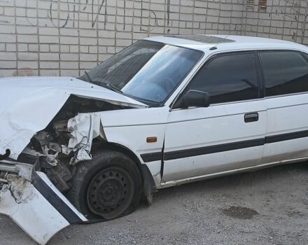 Белый Мазда 626, объемом двигателя 2 л и пробегом 395 тыс. км за 250 $, фото 1 на Automoto.ua