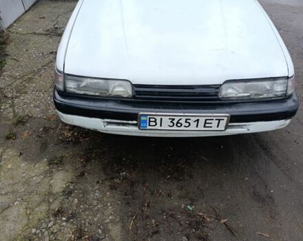 Белый Мазда 626, объемом двигателя 2 л и пробегом 516 тыс. км за 592 $, фото 1 на Automoto.ua