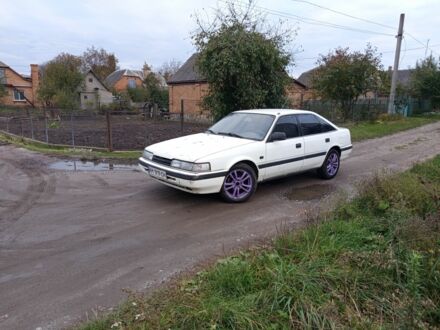 Белый Мазда 626, объемом двигателя 2 л и пробегом 300 тыс. км за 800 $, фото 1 на Automoto.ua