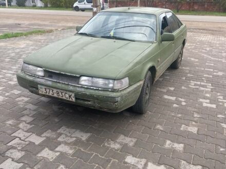 Белый Мазда 626, объемом двигателя 2 л и пробегом 722 тыс. км за 716 $, фото 1 на Automoto.ua