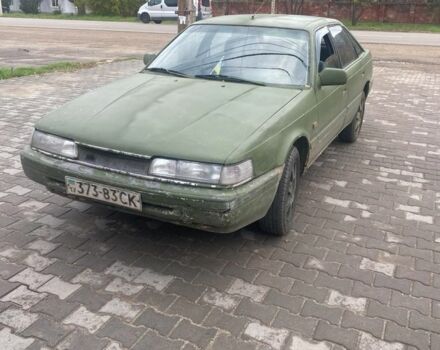 Белый Мазда 626, объемом двигателя 2 л и пробегом 722 тыс. км за 716 $, фото 1 на Automoto.ua