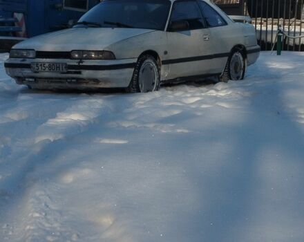 Белый Мазда 626, объемом двигателя 2 л и пробегом 300 тыс. км за 271 $, фото 1 на Automoto.ua