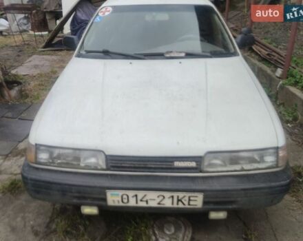 Белый Мазда 626, объемом двигателя 2 л и пробегом 379 тыс. км за 1500 $, фото 1 на Automoto.ua