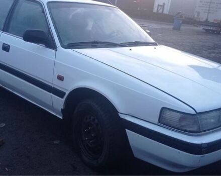 Белый Мазда 626, объемом двигателя 2 л и пробегом 255 тыс. км за 1100 $, фото 1 на Automoto.ua