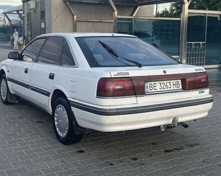 Белый Мазда 626, объемом двигателя 2 л и пробегом 350 тыс. км за 841 $, фото 1 на Automoto.ua