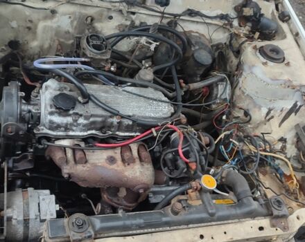 Белый Мазда 626, объемом двигателя 2 л и пробегом 380 тыс. км за 339 $, фото 1 на Automoto.ua