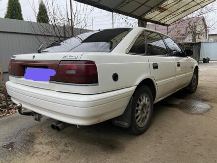 Белый Мазда 626, объемом двигателя 2 л и пробегом 356 тыс. км за 2200 $, фото 1 на Automoto.ua