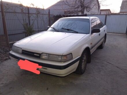 Белый Мазда 626, объемом двигателя 2 л и пробегом 356 тыс. км за 1200 $, фото 1 на Automoto.ua