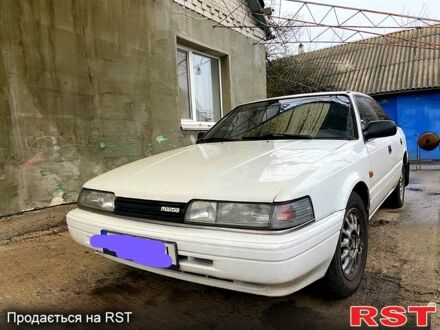 Белый Мазда 626, объемом двигателя 2 л и пробегом 356 тыс. км за 2200 $, фото 1 на Automoto.ua