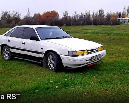 Белый Мазда 626, объемом двигателя 2.2 л и пробегом 65 тыс. км за 1100 $, фото 1 на Automoto.ua