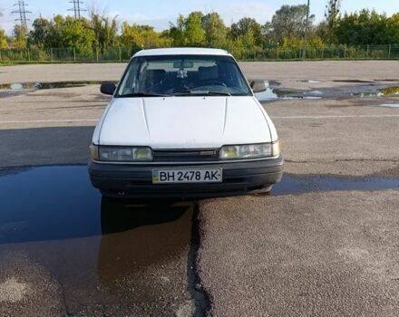 Білий Мазда 626, об'ємом двигуна 1.8 л та пробігом 335 тис. км за 672 $, фото 1 на Automoto.ua