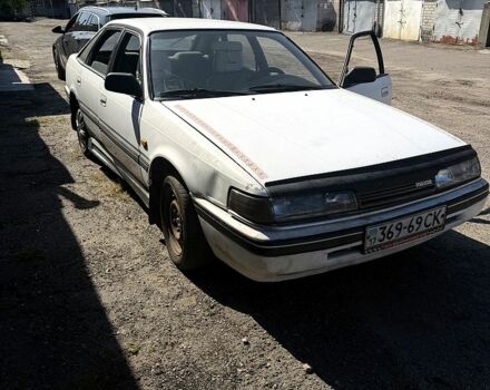 Білий Мазда 626, об'ємом двигуна 2 л та пробігом 200 тис. км за 600 $, фото 1 на Automoto.ua