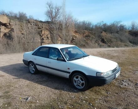 Белый Мазда 626, объемом двигателя 2 л и пробегом 345 тыс. км за 1267 $, фото 1 на Automoto.ua
