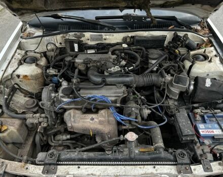 Белый Мазда 626, объемом двигателя 2 л и пробегом 412 тыс. км за 2500 $, фото 1 на Automoto.ua