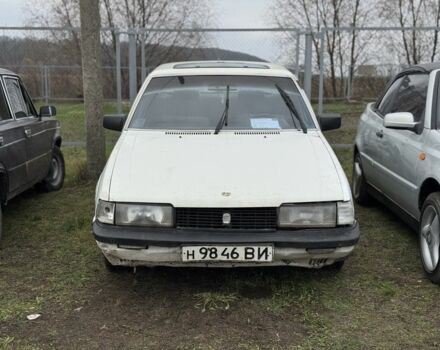 Белый Мазда 626, объемом двигателя 0 л и пробегом 300 тыс. км за 285 $, фото 1 на Automoto.ua