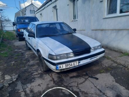 Білий Мазда 626, об'ємом двигуна 2 л та пробігом 300 тис. км за 600 $, фото 1 на Automoto.ua