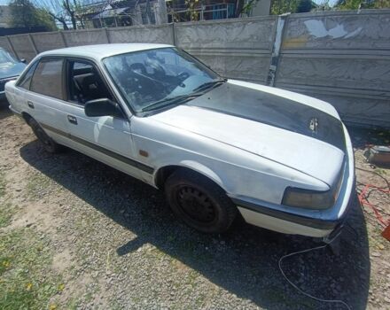 Білий Мазда 626, об'ємом двигуна 2 л та пробігом 234 тис. км за 256 $, фото 1 на Automoto.ua