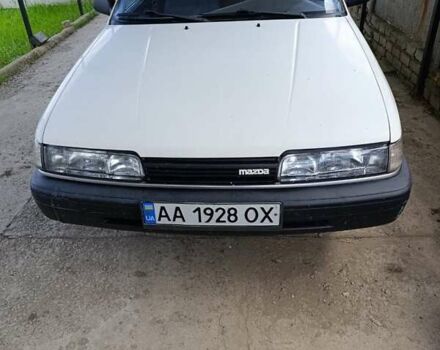 Белый Мазда 626, объемом двигателя 2 л и пробегом 350 тыс. км за 750 $, фото 1 на Automoto.ua