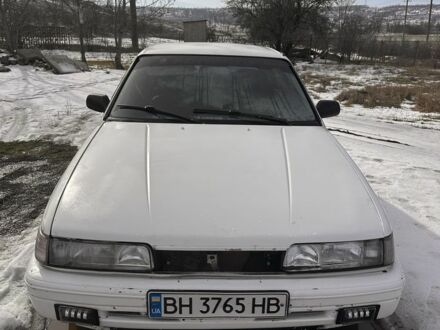 Білий Мазда 626, об'ємом двигуна 1.8 л та пробігом 300 тис. км за 1200 $, фото 1 на Automoto.ua