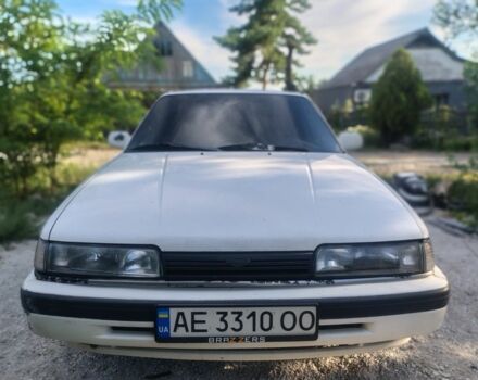 Білий Мазда 626, об'ємом двигуна 2 л та пробігом 422 тис. км за 953 $, фото 1 на Automoto.ua