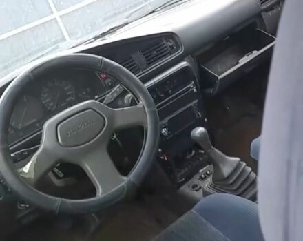 Белый Мазда 626, объемом двигателя 2 л и пробегом 350 тыс. км за 458 $, фото 1 на Automoto.ua