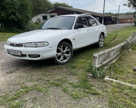 Белый Мазда 626, объемом двигателя 2 л и пробегом 200 тыс. км за 1400 $, фото 1 на Automoto.ua