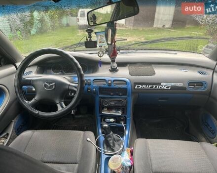 Белый Мазда 626, объемом двигателя 2 л и пробегом 500 тыс. км за 2300 $, фото 1 на Automoto.ua