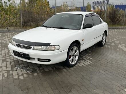 Белый Мазда 626, объемом двигателя 2 л и пробегом 300 тыс. км за 1099 $, фото 1 на Automoto.ua