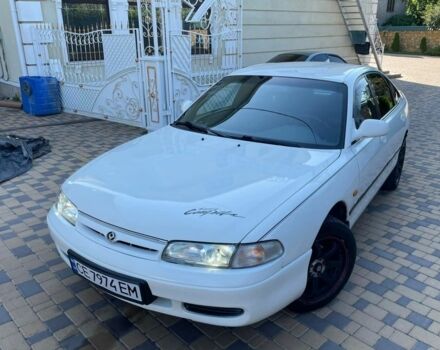 Белый Мазда 626, объемом двигателя 2 л и пробегом 146 тыс. км за 2250 $, фото 1 на Automoto.ua