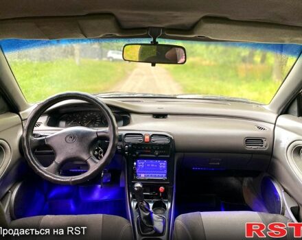 Белый Мазда 626, объемом двигателя 1.8 л и пробегом 429 тыс. км за 850 $, фото 1 на Automoto.ua