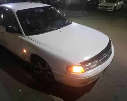 Белый Мазда 626, объемом двигателя 2 л и пробегом 306 тыс. км за 1200 $, фото 1 на Automoto.ua