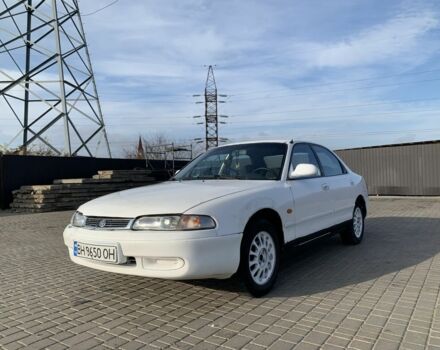 Белый Мазда 626, объемом двигателя 2 л и пробегом 150 тыс. км за 1200 $, фото 1 на Automoto.ua