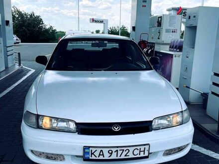Белый Мазда 626, объемом двигателя 1.8 л и пробегом 303 тыс. км за 1500 $, фото 1 на Automoto.ua
