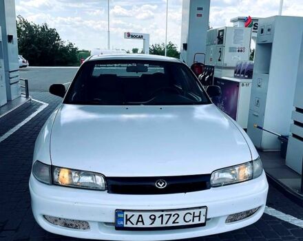 Белый Мазда 626, объемом двигателя 1.8 л и пробегом 303 тыс. км за 1500 $, фото 1 на Automoto.ua