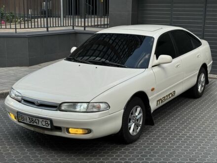 Белый Мазда 626, объемом двигателя 2 л и пробегом 297 тыс. км за 2650 $, фото 1 на Automoto.ua