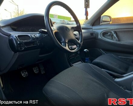 Белый Мазда 626, объемом двигателя 2 л и пробегом 124 тыс. км за 1300 $, фото 1 на Automoto.ua