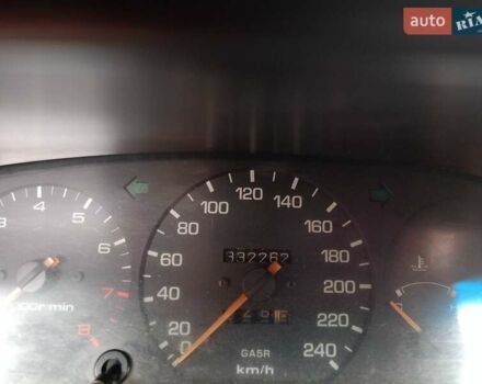 Белый Мазда 626, объемом двигателя 2.5 л и пробегом 330 тыс. км за 2300 $, фото 1 на Automoto.ua