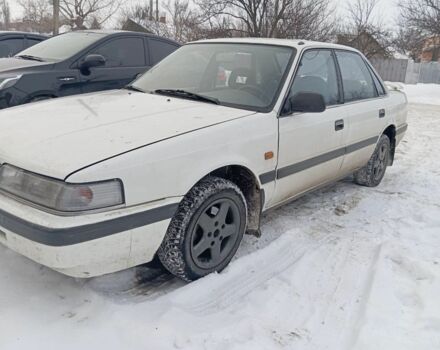 Белый Мазда 626, объемом двигателя 0 л и пробегом 500 тыс. км за 900 $, фото 1 на Automoto.ua