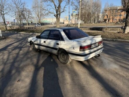 Белый Мазда 626, объемом двигателя 0 л и пробегом 325 тыс. км за 800 $, фото 1 на Automoto.ua